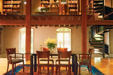 Urban light wood floor dining room photo in Philadelphia with white walls and no fireplace