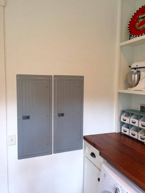 Finally got around to covering my ugly breaker panels!