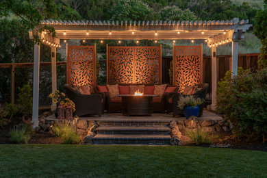 Photo of an expansive backyard full sun garden in San Francisco with concrete pavers.