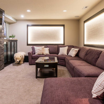 Modern Windowless Lower Level Media and Family Room Featuring "Faux Windows"