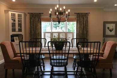 Kitchen/dining room combo - mid-sized country dark wood floor and brown floor kitchen/dining room combo idea in Boston with beige walls and no fireplace
