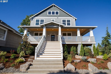 Example of a mid-sized trendy exterior home design in Portland