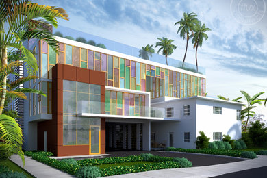 マイアミにある高級なモダンスタイルのおしゃれな家の外観 (ガラスサイディング、マルチカラーの外壁、混合材屋根) の写真