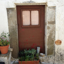 Looking at doors in Castelo de Vide
