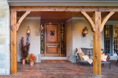 Example of a large southwest beige two-story stone house exterior design in San Francisco