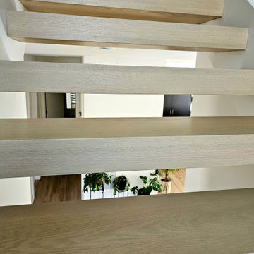 Project #111 | Open-Riser Staircase with Glass Panel Detail