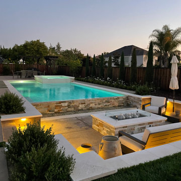 Livermore, Infinity edge swimming pool with a sunken firepit seating area