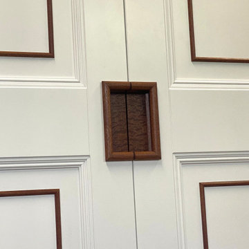 Bespoke Fitted Wardrobes with Painted Panelled Doors and Wood Inlay | Cheltenham