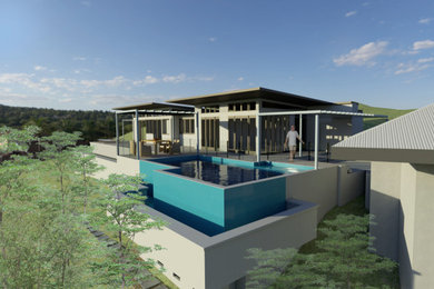 Photo of a mid-sized modern home design in Gold Coast - Tweed.