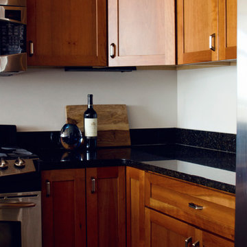 Transitional Kitchen with Cherry Shaker Cabinets and Pewter Cabinet Hardware