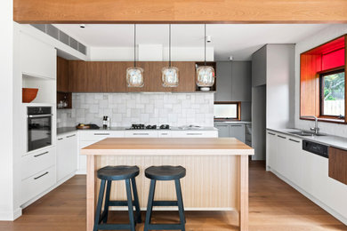 Photo of a mid-sized contemporary kitchen in Melbourne.