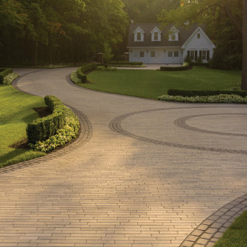 Traditional Curved Driveway with a Sophisticated Inlay Design
