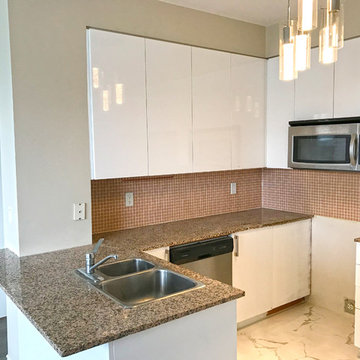 High-gloss custom kitchen cabinet refacing in Toronto