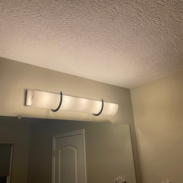 Fast cover-up for a metal bath light fixture
