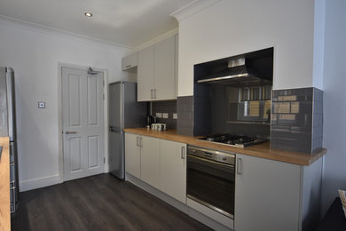 This is an example of a modern kitchen in Kent.