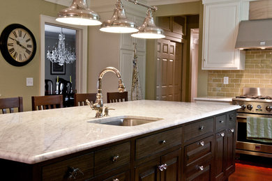 Inspiration for a huge timeless u-shaped dark wood floor and brown floor kitchen pantry remodel in Other with an integrated sink, shaker cabinets, white cabinets, marble countertops, green backsplash, ceramic backsplash, stainless steel appliances and an island