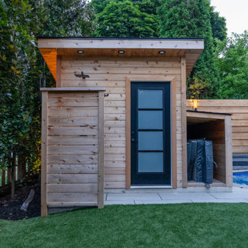 Pool with Rock Waterfall and Storage Shed