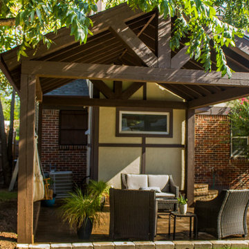 Compact Backyard Pavilion with a Brick Paver Patio
