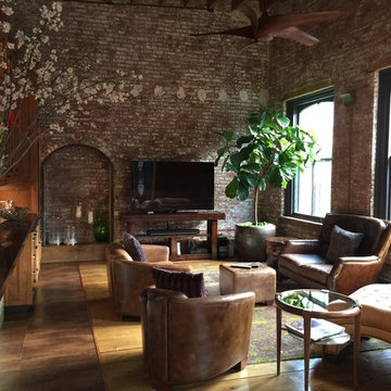 Living Areas Highlighting Exposed Brick Walls. Wood Plank Floor.