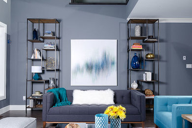 Example of a large transitional open concept medium tone wood floor family room design in Other with gray walls, a standard fireplace, a stone fireplace and a wall-mounted tv