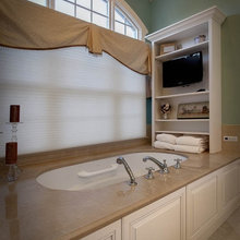 bookcases in bathroom