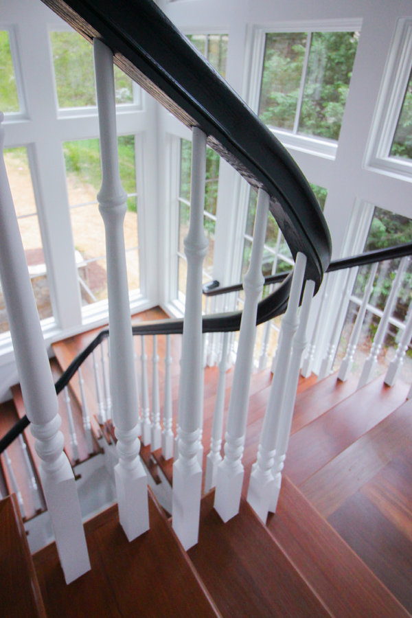 Powerful Impression by Floating Staircase in Suburban Foyer