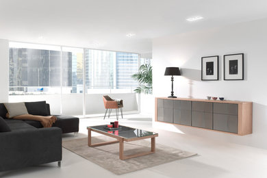 Example of a mid-sized trendy enclosed marble floor and white floor family room design in Los Angeles with white walls, no fireplace and no tv