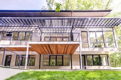 Inspiration for a modern three-story house exterior remodel in DC Metro