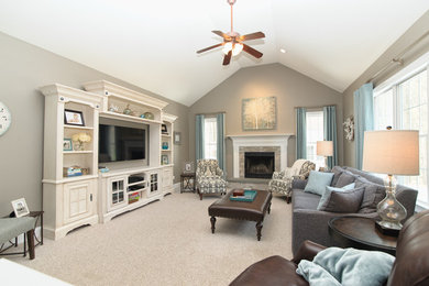 This is an example of a transitional family room in Boston.