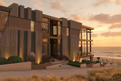 Inspiration for a large modern gray three-story metal exterior home remodel
