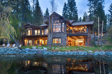Example of a large mountain style home design design in Seattle