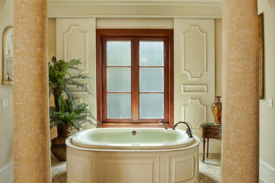 Example of a tuscan bathroom design in Charlotte