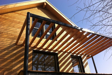Idée de décoration pour une terrasse chalet.