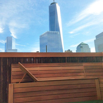 TriBeCa Rooftop Deck with Custom Planter Benches, Bamboo Fencing, and Art. Turf