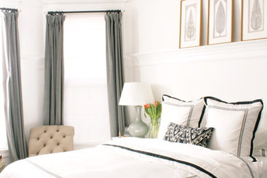 Mid-sized traditional master bedroom in San Francisco with white walls and medium hardwood floors.