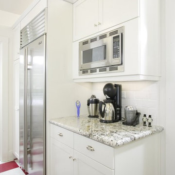 Beautiful White Kitchen with Red & White Floors plus red accessories