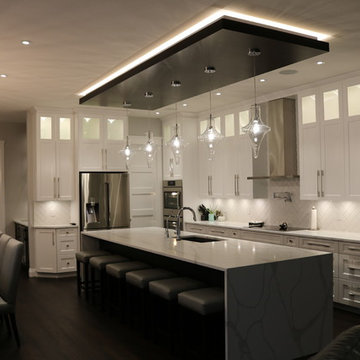 Luxury Kitchen with Dark Island and White Perimeter Cabinets