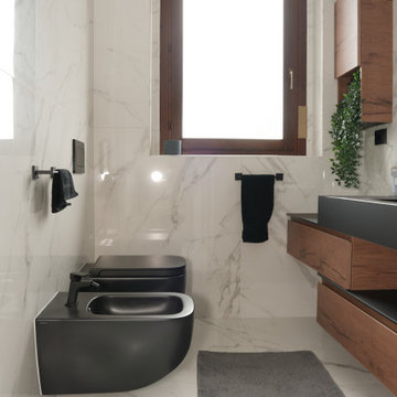 Appartamento contemporaneo con open space e bagni in marmo