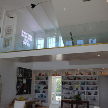 Glass Balustrade with Aluminum Base Rail Finished with Satin Brass Cladding
