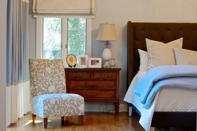 Example of a transitional bedroom design in Jacksonville