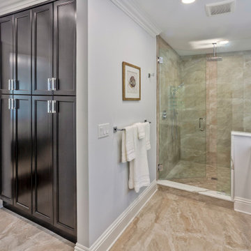 Spa-Like Master Bathroom With Vertical Linen Cabinetry and Full-Tile Walk-In Sho