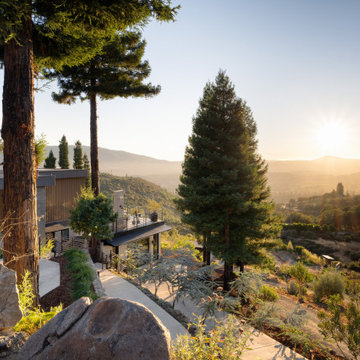A little farm below a hillside resort-style off-the-grid view home