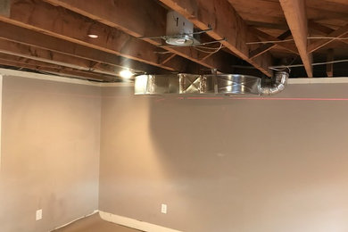 Example of a trendy basement design in Toronto