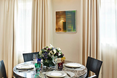 Photo of a contemporary dining room in London.
