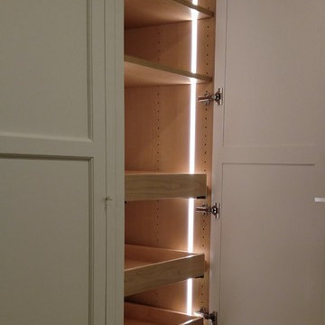 LED lighting for full view of everything on the shelves and roll outs.