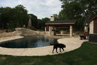 Example of a mountain style pool design in Houston