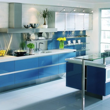 Blue lacquered kitchen with floating cabinets