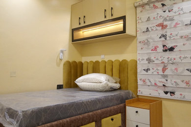 Bedroom - contemporary bedroom idea in Other