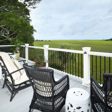 This added upper-level deck is the perfect place for a cocktail.