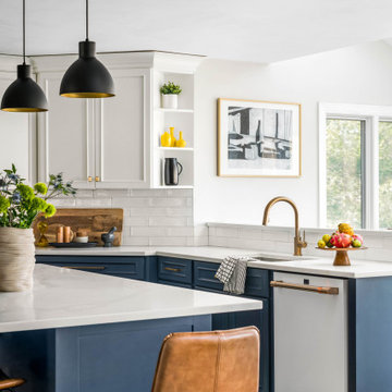 Contemporary Kitchen With White Uppers and Blue Base Cabinets